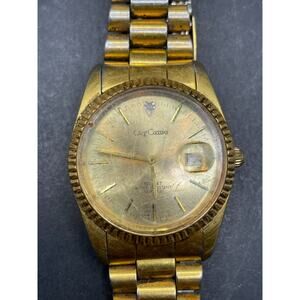 Vtg Oleg Cassini Mens 31-727DG Date Fluted Gold Tone Quartz 35mm Watch 7.5"